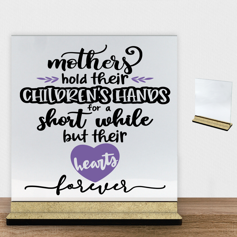 Mothers hold their children's hands... | Glasskilt inkl. fod (træfiber)