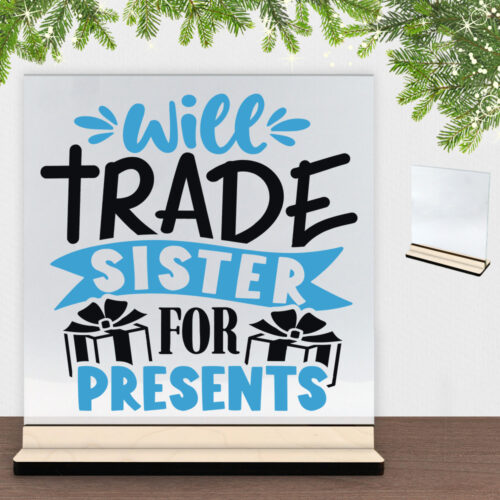 Funny Christmas - Will trade sister for presents | Glasskilt inkl. fod (poppel krydsfinér)